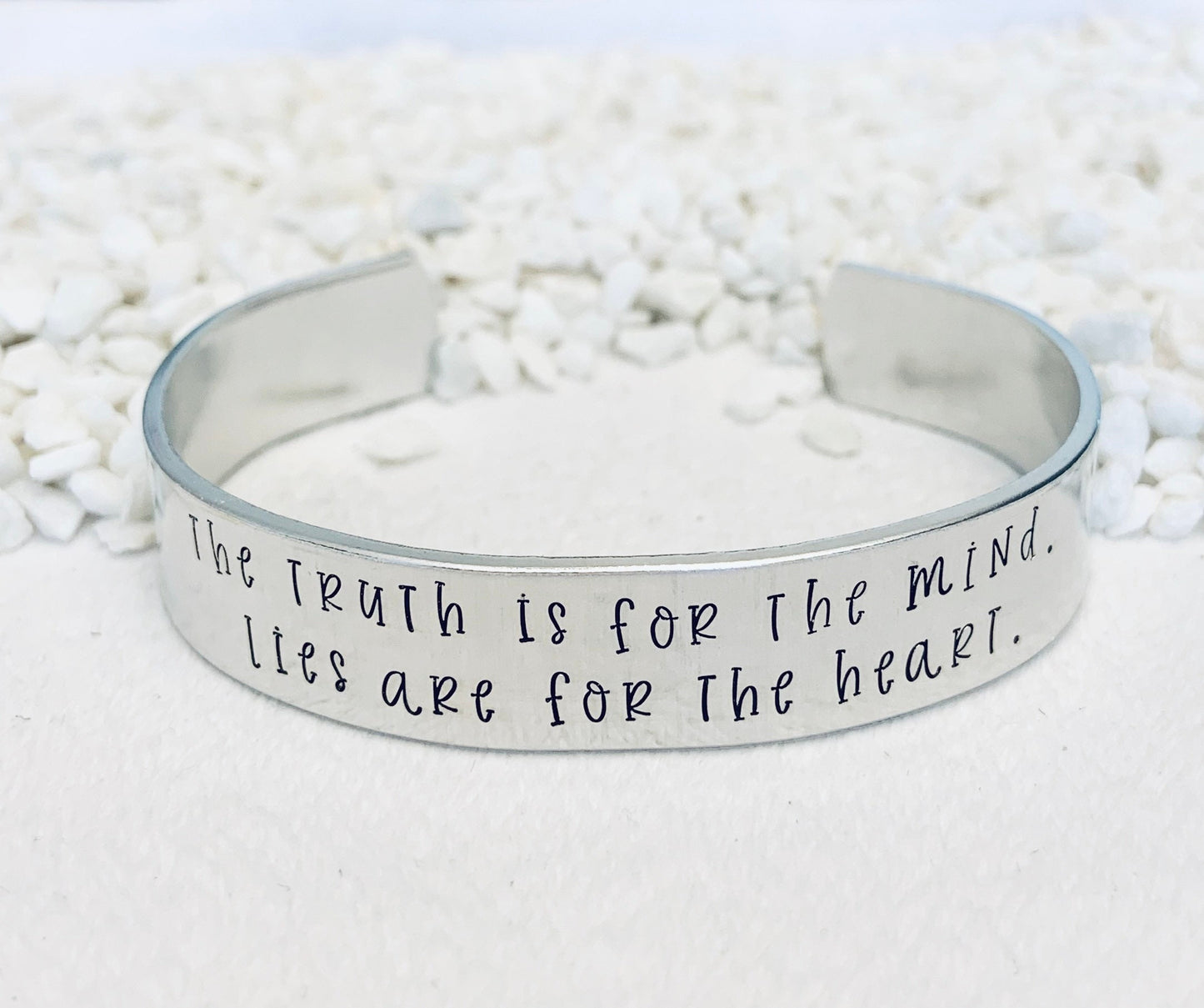 The truth is for the mind. Lies are for the heart. (Tarryn Fisher) - Cuff Bracelet